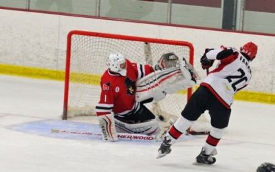 Ice Dogs defeat Titans in first game of weekend